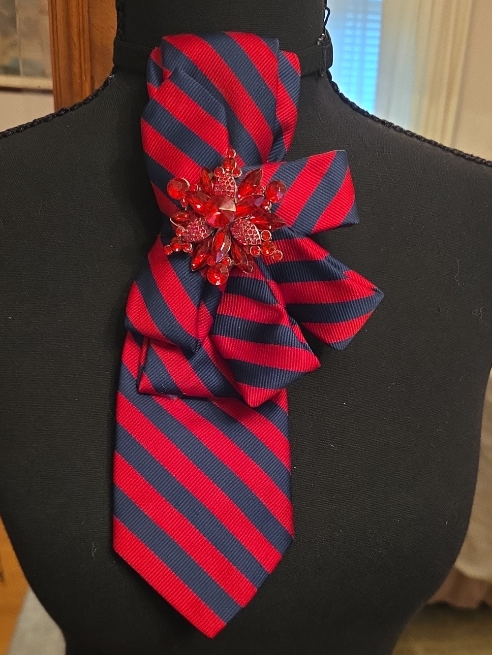 Striped Red and Navy Neck Tie with Red Brooch